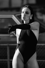 Sexy woman with finger gun. Female model with Bang-bang hand gun gesture sign. Shooting fingers....