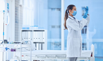 Woman, doctor and needle with vial in hospital for vaccination, medicine or healthcare safety of mpox. Female person, syringe and face mask, pharmaceutical drugs and fight virus of injection solution