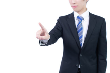指先で何かに触れるビジネスマン