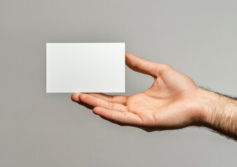 Obraz premium White blank flyer brochure booklet in hand. man shows how to fold offset paper. Sheet template. Booklet design. Paper display read first person.