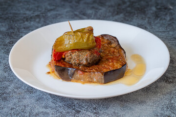 Traditional delicious Turkish food; Kofte kebab wrapped in eggplant (Turkish name; Islim - islim kebabi or kurdan kebabi)