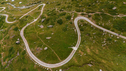 Aerial view of Mount Cervino, The Matterhorn, seen from Breuil-Cervinia. Green valleys and waterways that descend from the glaciers. Italy. Paths and trails in the Cervinia valley, refuges