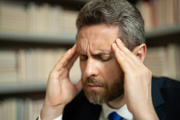 Close up portrait of stressed man with headache migraine. Stressed man with headache. Tired...