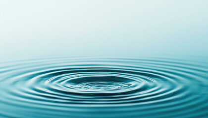 Serene water ripple effect with a calm turquoise hue, evoking tranquility and peacefulness in nature.