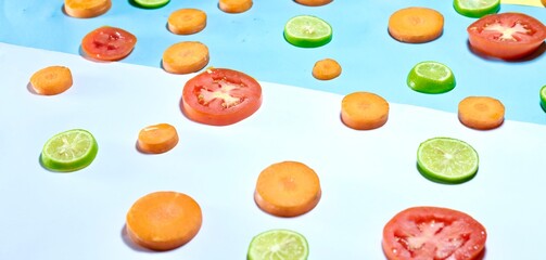 Fresh organic healthy fruits and vegetables decorated on colourful background