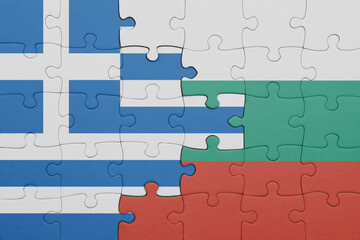 puzzle with the colourful national flag of bulgaria and flag of greece.