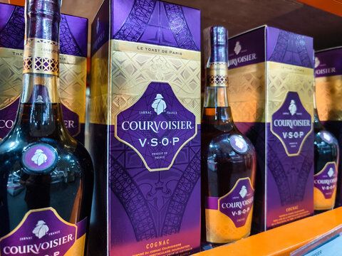 Courvoisier VSOP cognac bottles on supermarket shelf display