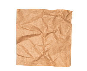 Brown craft baking paper sheet top view isolated on white background, parchment for baking culinary, piece of wrinkled or crumpled paper texture