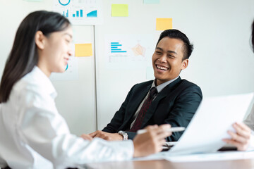 Professional Business Meeting with Smiling Colleagues in Modern Office Setting