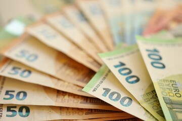 Pile of euro paper banknotes as finance background