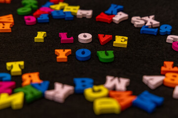 Obraz premium Multicolored wooden letters spelling 