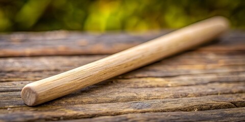 A close-up shot of a wooden stick , nature, outdoors, texture, wood, simplicity, minimalist, rustic, isolated, single object