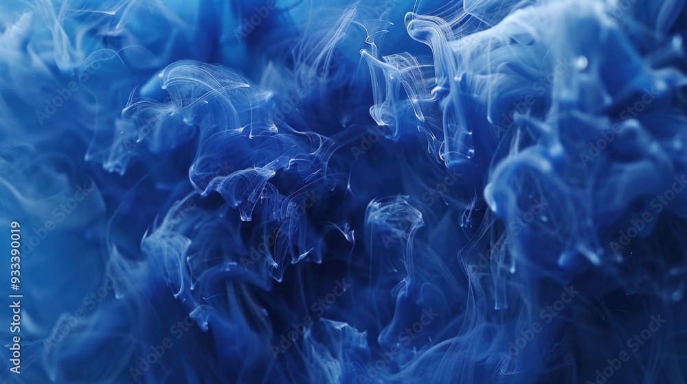 Poster a close-up of indigo ink swirling in water, creating mesmerizing patterns
