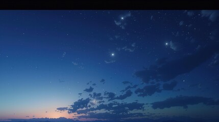 Fototapeta premium A serene indigo sky at twilight, with the first stars beginning to twinkle