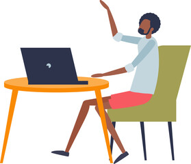Fototapeta premium Young man sitting at a round table working on a laptop, possibly in a casual home office setting.
