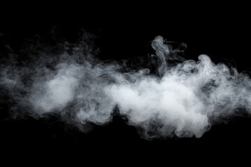 Thick white smoke billows against a deep black background, creating a mysterious and atmospheric scene.