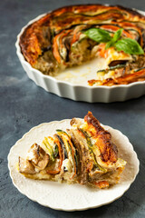 Vegetable tart with zucchini, eggplant and carrots. Pie with baked vegetables.