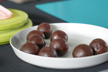 Round shaped red bean paste in a plate