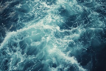 Fototapeta premium A calm body of water with small waves, suitable for use in scenes about relaxation or leisure activities