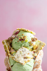 egg puff, bubble waffle, eggette, pancake balls, pancake waffle, egglet, puffle, Hong Kong cakes, Hong Kong waffles with pistachio ice-cream and caramel close up