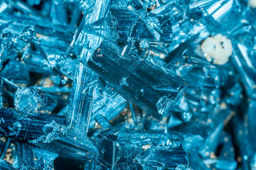 Blue Crystal Mineral Stone. Gems. Mineral crystals in the natural environment. Texture of precious and semiprecious stones. Seamless background with copy space colored shiny surface of precious stones
