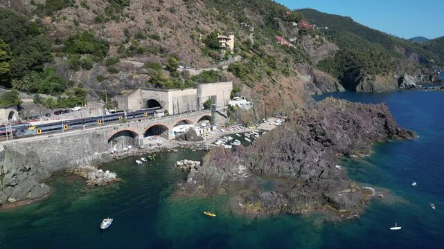 Europe, Italy, Framura is a little sea village in Liguria close to 5 terre ( five island )  - drone aerial view of mediterranean coast - natural harbour and beach 
