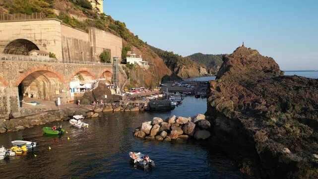 Europe, Italy, Framura is a little sea village in Liguria close to 5 terre ( five island )  - drone aerial view of mediterranean coast - natural harbour and beach 