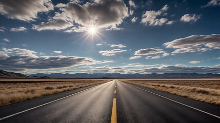 Naklejka premium Endless Road with a Sunlit Sky, Adventure road in desert