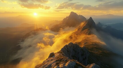 Fototapeta premium Majestic Sunrise Over Mountain Range with Misty Valleys Below