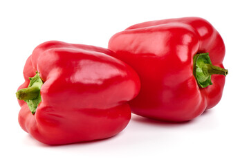 Red ripe bell peppers, isolated on white background.