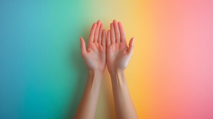 Obraz premium Hands reaching upwards against a colorful gradient background