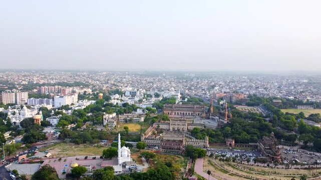  Aerial view of bada Imambara complex on city road with rumi darwaza Islamic architecture built by nawab asaf-ud-daulain 1784, lucknow, uttar pradesh, India, asia.
