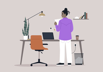 An individual in a purple shirt thoughtfully reviews a document while standing by a stylish desk in a contemporary office