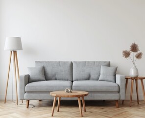 style living room, gray sofa with three seats and coffee table in front of it, white walls behind the wall