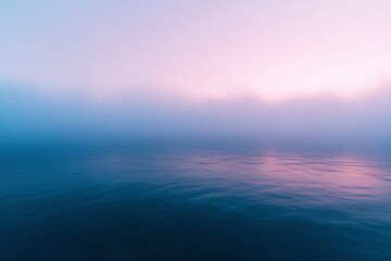 Obraz premium Serene Waters Under a Misty Pink and Blue Sky
