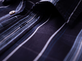 Close up of Men's checkered shirt.