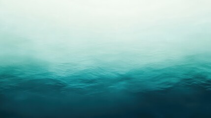 Fototapeta premium Calm and serene water surface with gentle waves, creating tranquil atmosphere. gradient of blue and green hues evokes sense of peace and relaxation. 