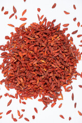 Dried Goji berries Lycium barbarum top view on a white background
