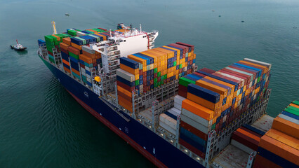Stern cargo container ship at sunset feight import export container box concept transportation...