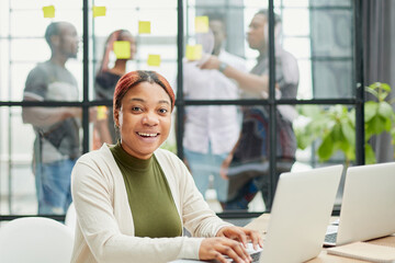 Cropped shot of an attractive young businesswoman working in her office.