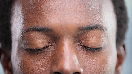 Close up of a Black man's face