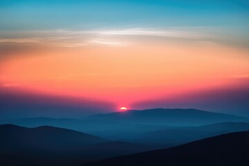 Obraz premium Silhouetted Mountain Range at Sunset with a Colorful Sky
