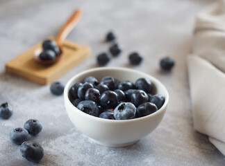 blueberries in a bowl on the table