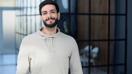 Portrait of a handsome businessman looking at camera