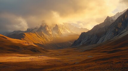 Sunrise over the Yading Nature Reserve, with golden light illuminating the peaks and casting long shadows across the valleys.