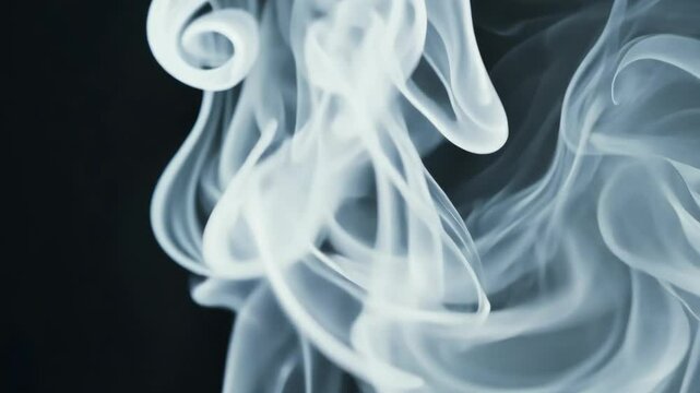Captivating smoke patterns swirling against a dark background in a serene setting