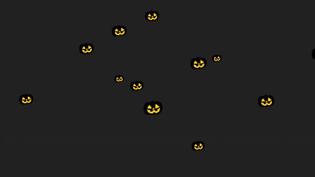 Halloween Jack-o'-Lanterns silhouette with its eyes and mouth glowing falling from top on light black or gray background. Happy Halloween, abstract background.