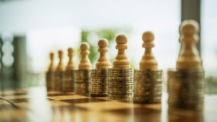A pile of money on a chessboard with pawns is an idea about business money management planning.