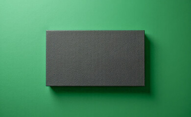 green business card bank card on a green textured background
