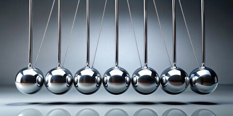 of Newton cradle demonstrating the cause and effect relationship between principles and morality, principles, morality